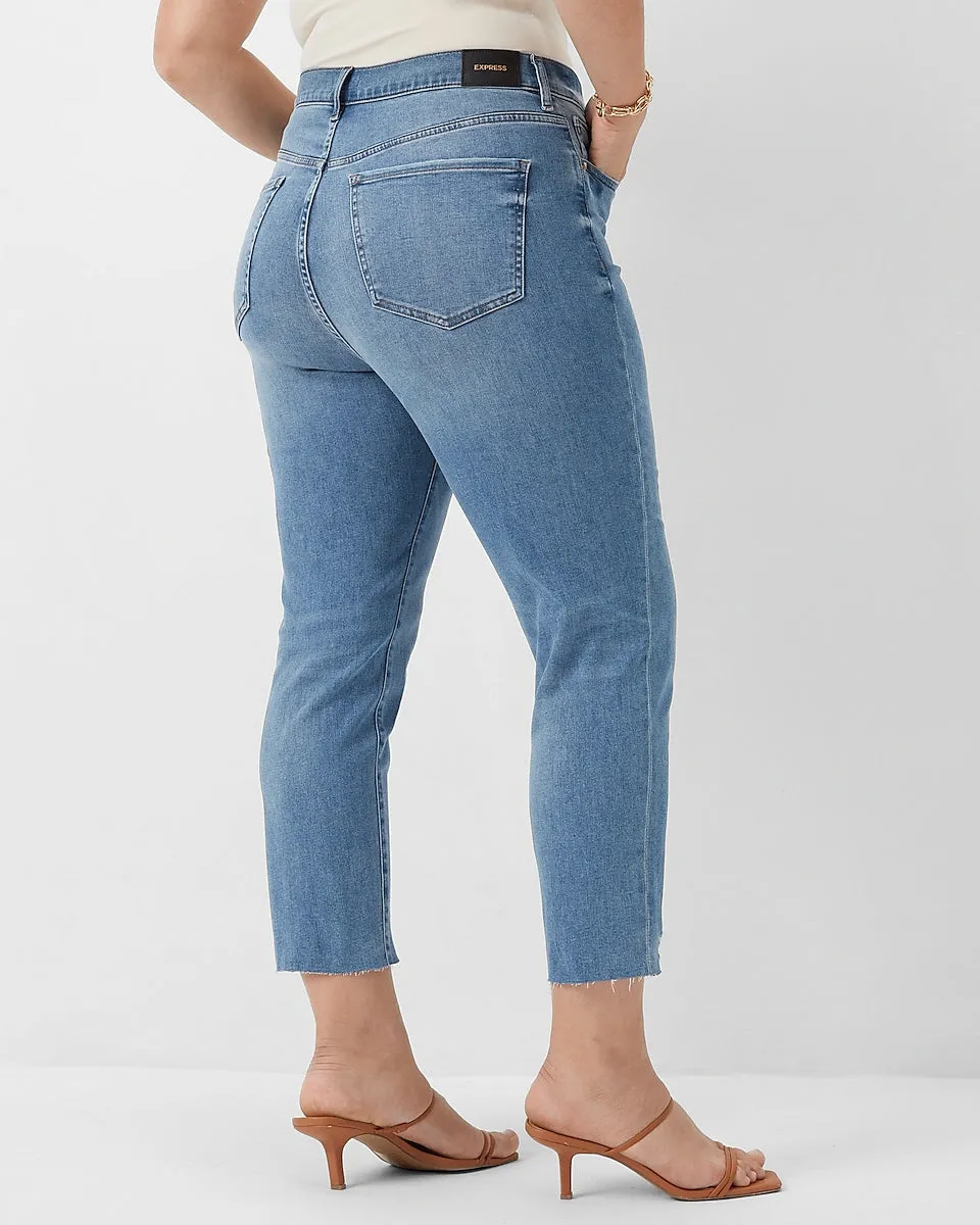 Super High Waisted Ripped Raw Step Hem Supersoft Mom Jeans in Medium Wash